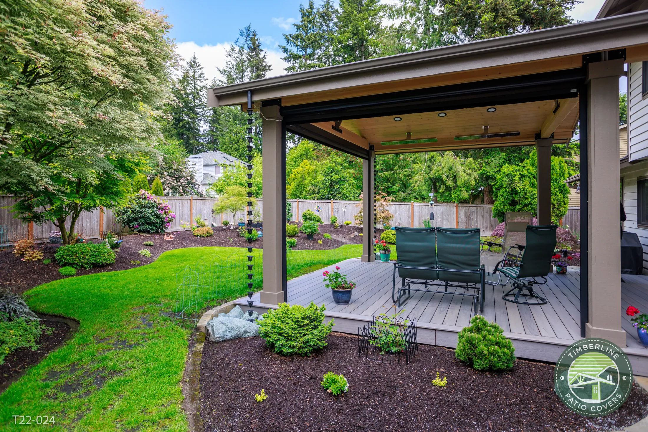 Waterproof under deck ceiling system creating a dry outdoor living space