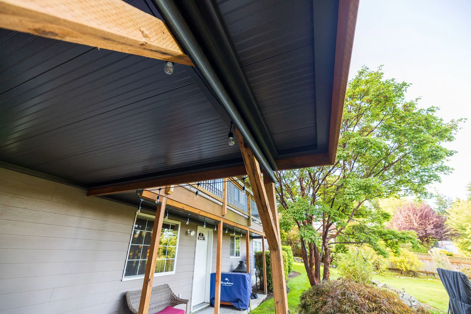 Dry, finished living space beneath an elevated deck